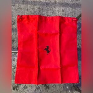 Ferrari Red Dust Bag with Drawstring Closure and Iconic Logo. 12”X12.5”